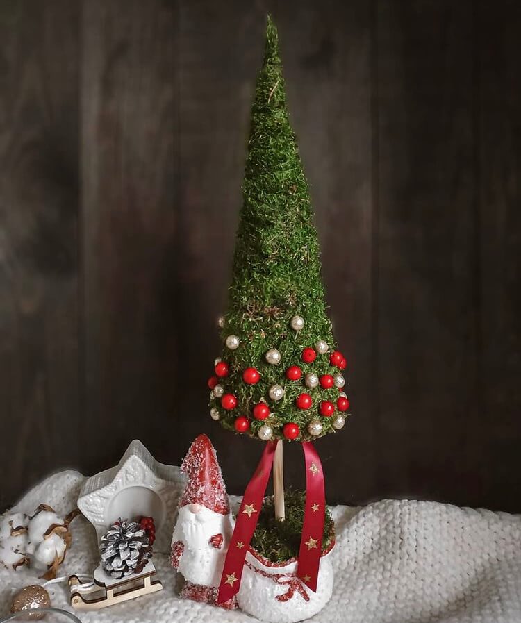 If you want to place multiple Christmas trees in your home. Then, a small tabletop Christmas tree is an ideal choice.