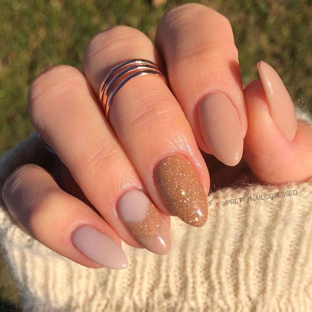 Gold nude almond nails