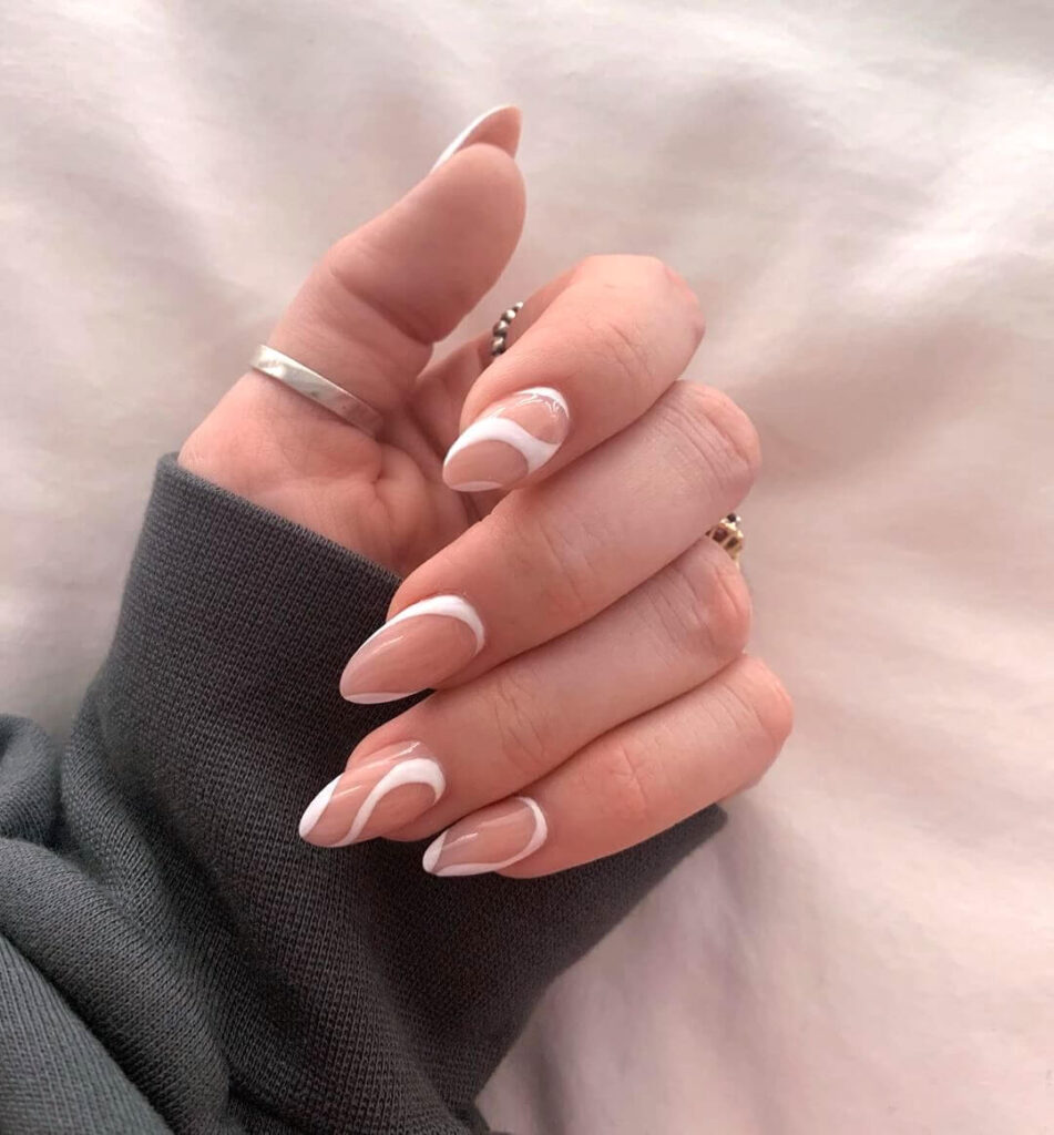 White swirled almond nails