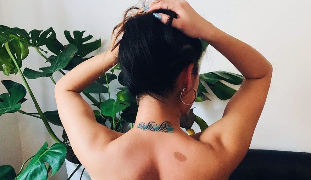 Natural neck tattoo