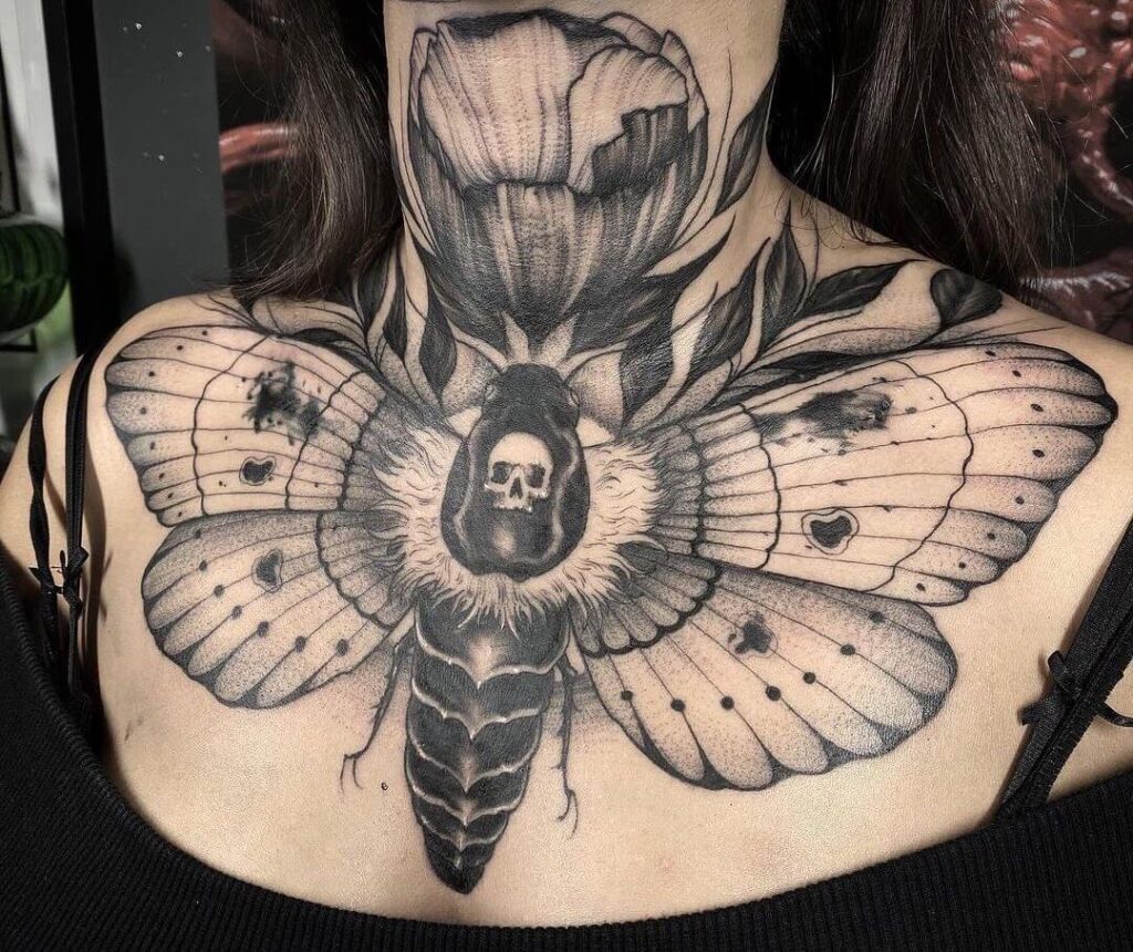 Cool moth neck tattoo