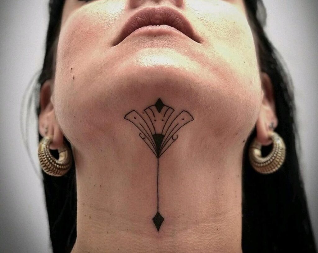 Arrow neck tattoo