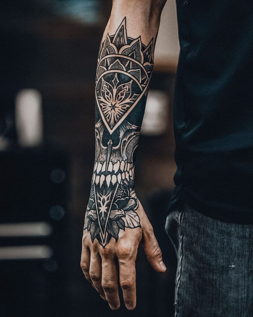 Creative skull half sleeve tattoo