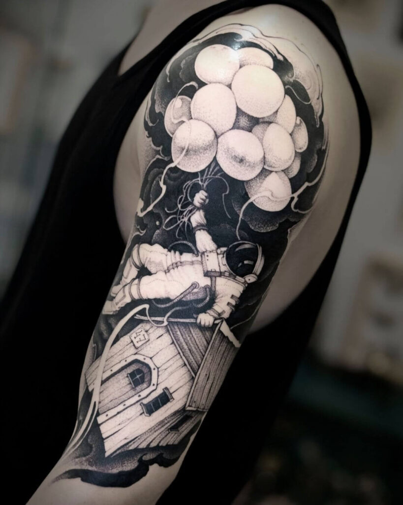 Astronaut sleeve tattoo