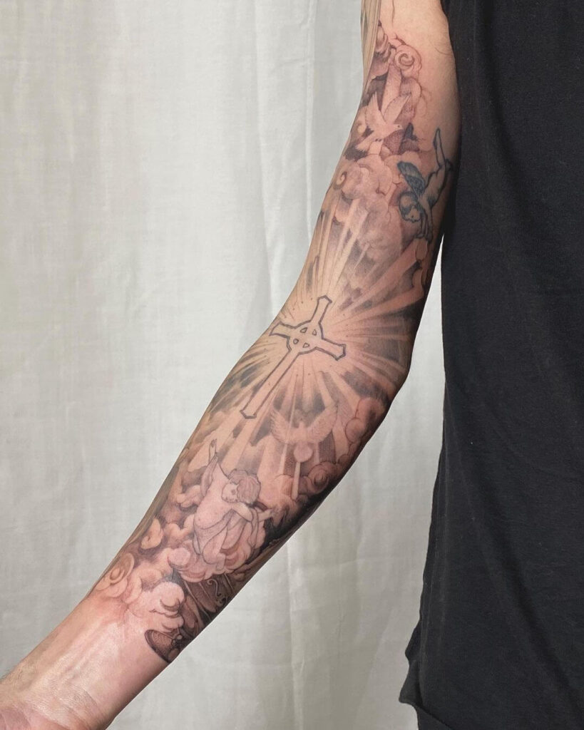 Religious sleeve tattoo