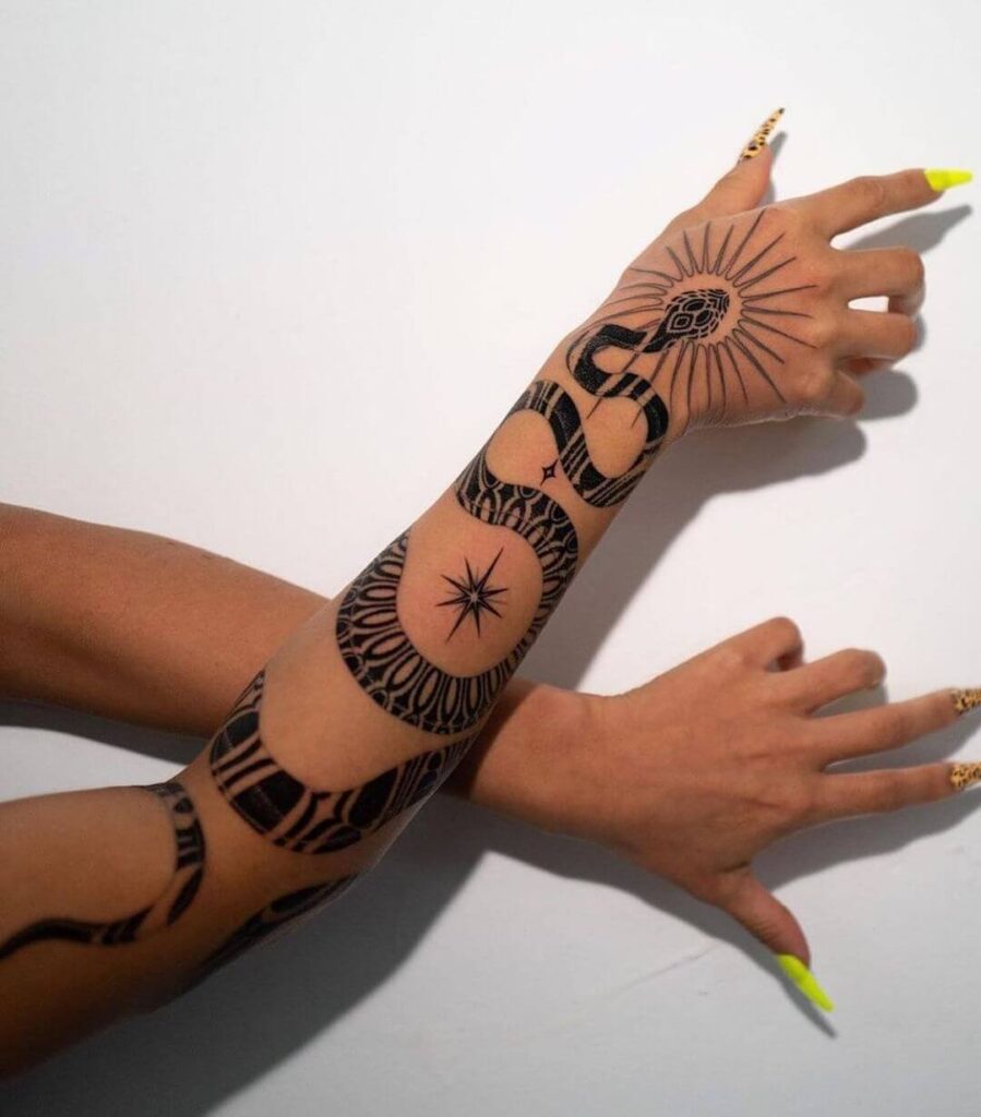 Charming snake sleeve tattoo