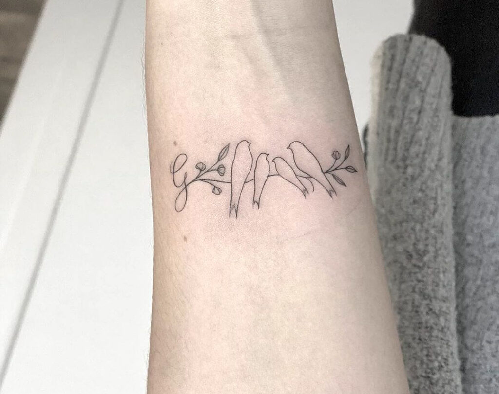 Bird family tattoo