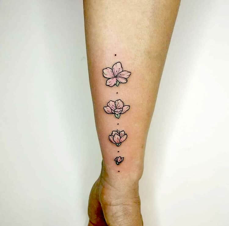 Meaningful flower family tattoos