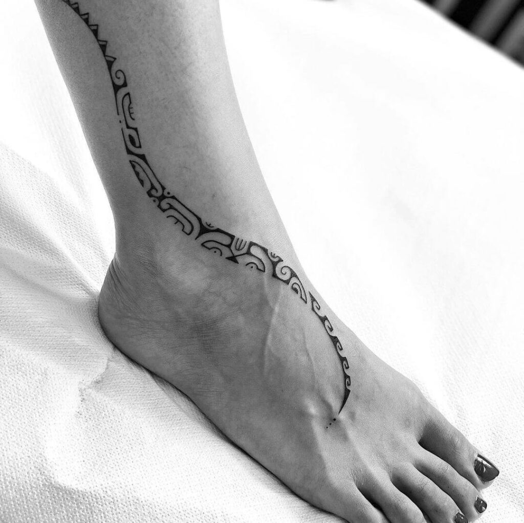 Curve tribe Foot tattoo