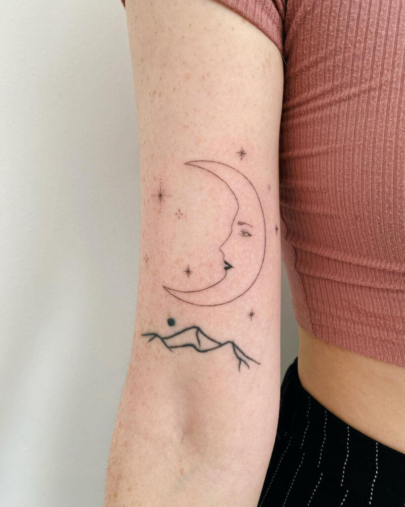 Face moon tattoo