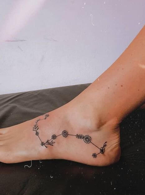 Flower constellation Foot tattoo