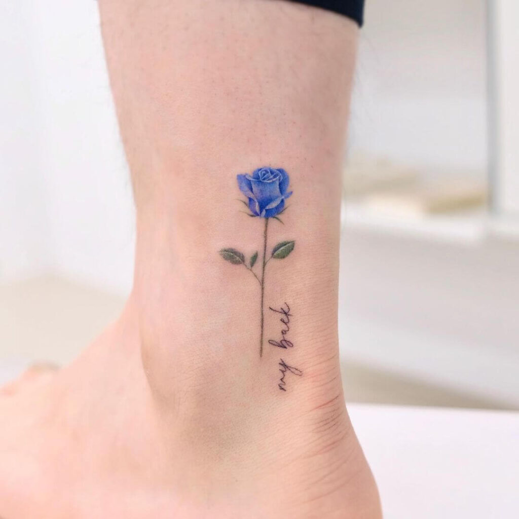 Charming blue rose ankle tattoo