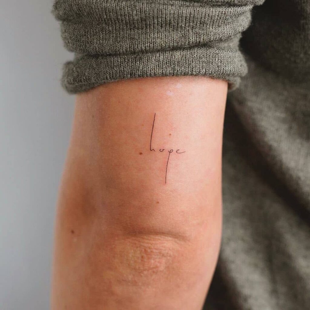 fine line quote tattoo