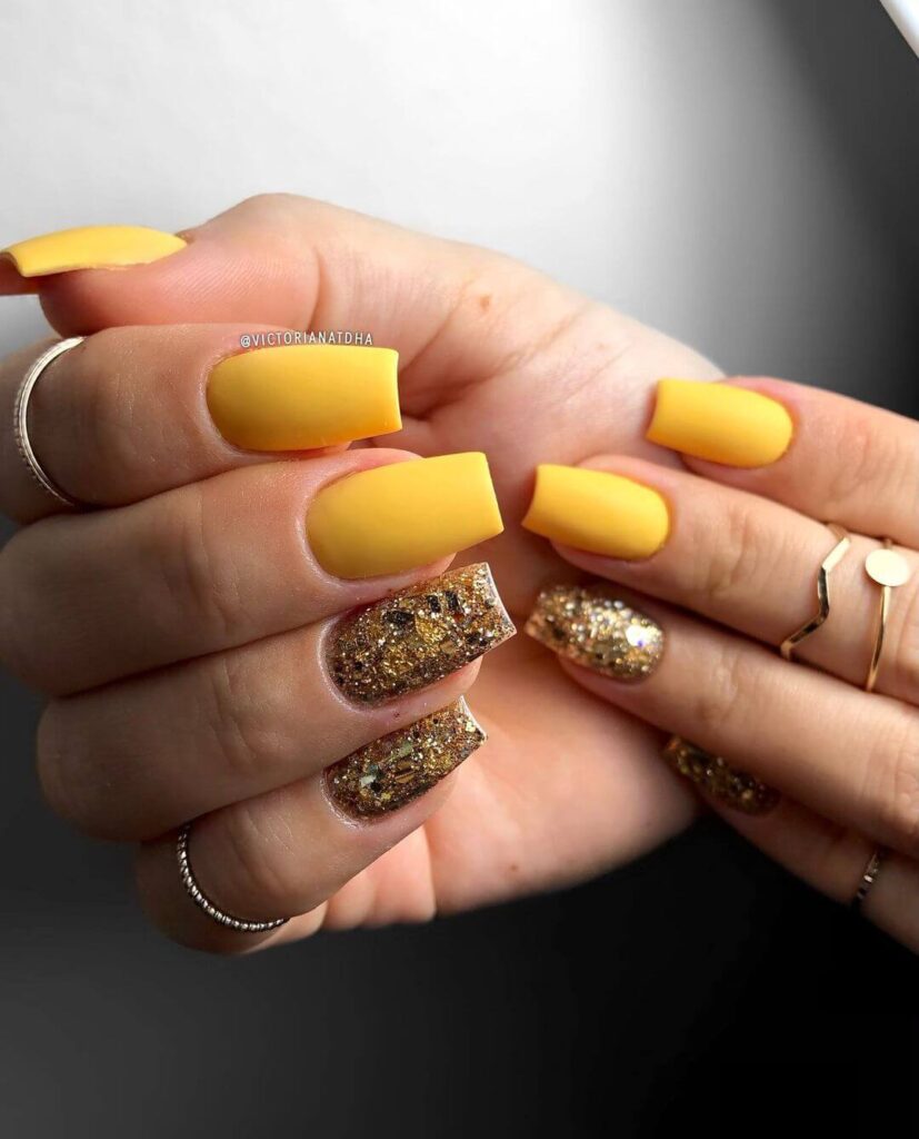 Yellow and gold square nails