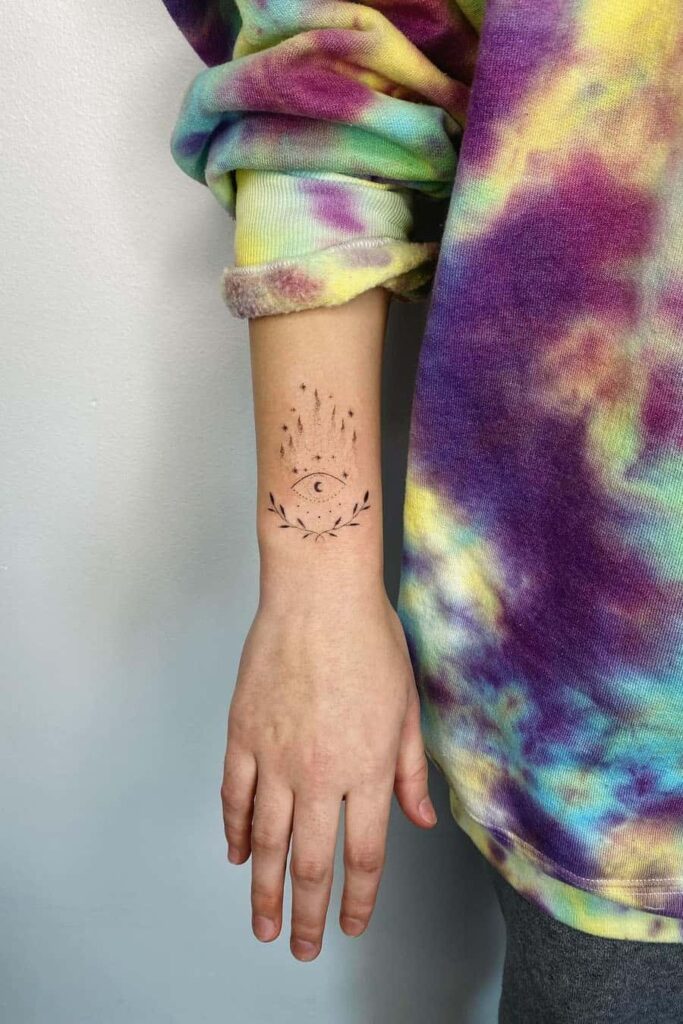 Minimalist style wrist tattoo
