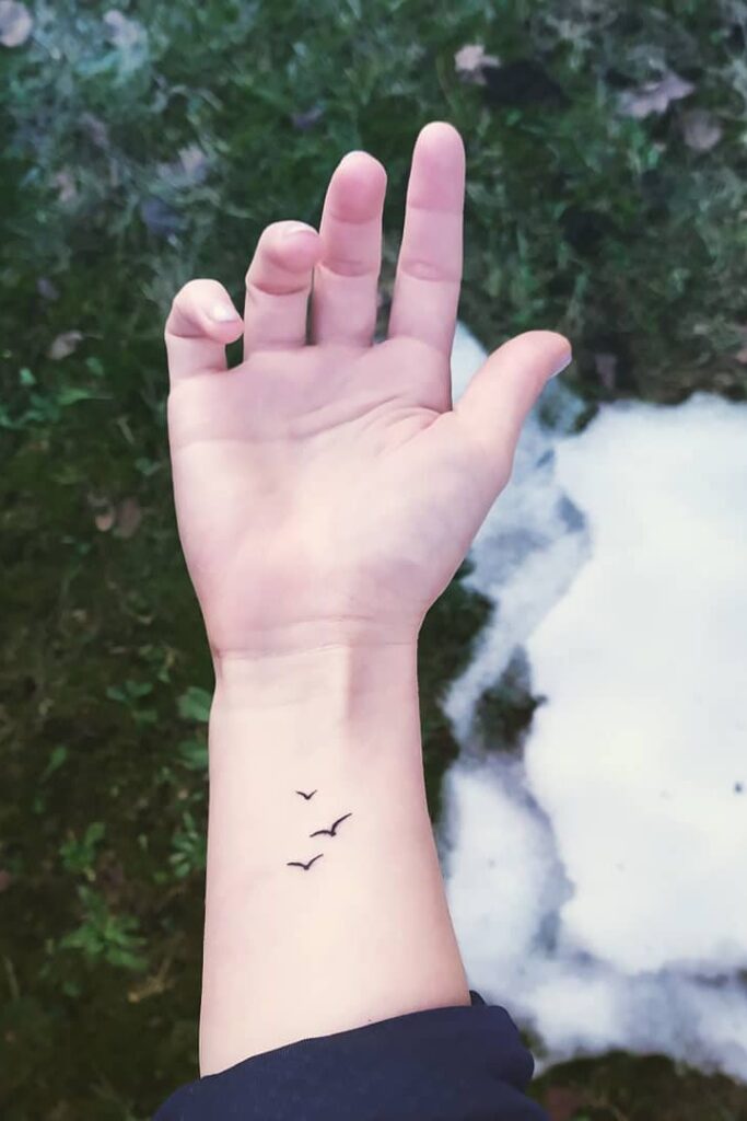 Flying Bird Wrist Tattoo