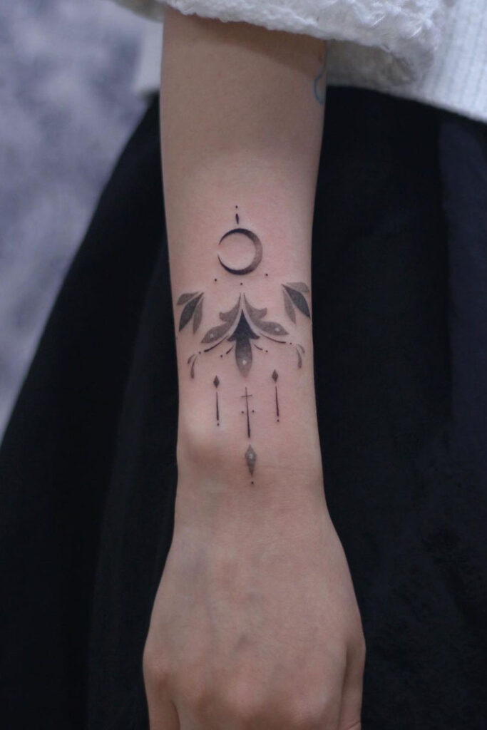 Moon bracelet tattoo