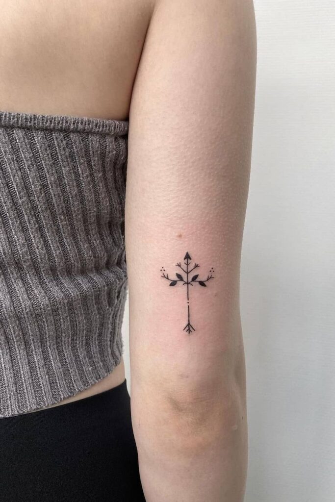 Arrow line tattoo