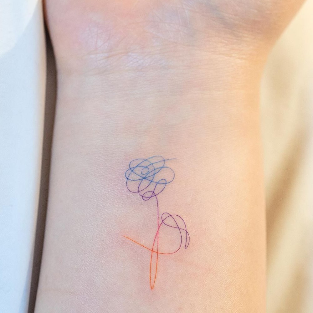 Color rose line tattoo