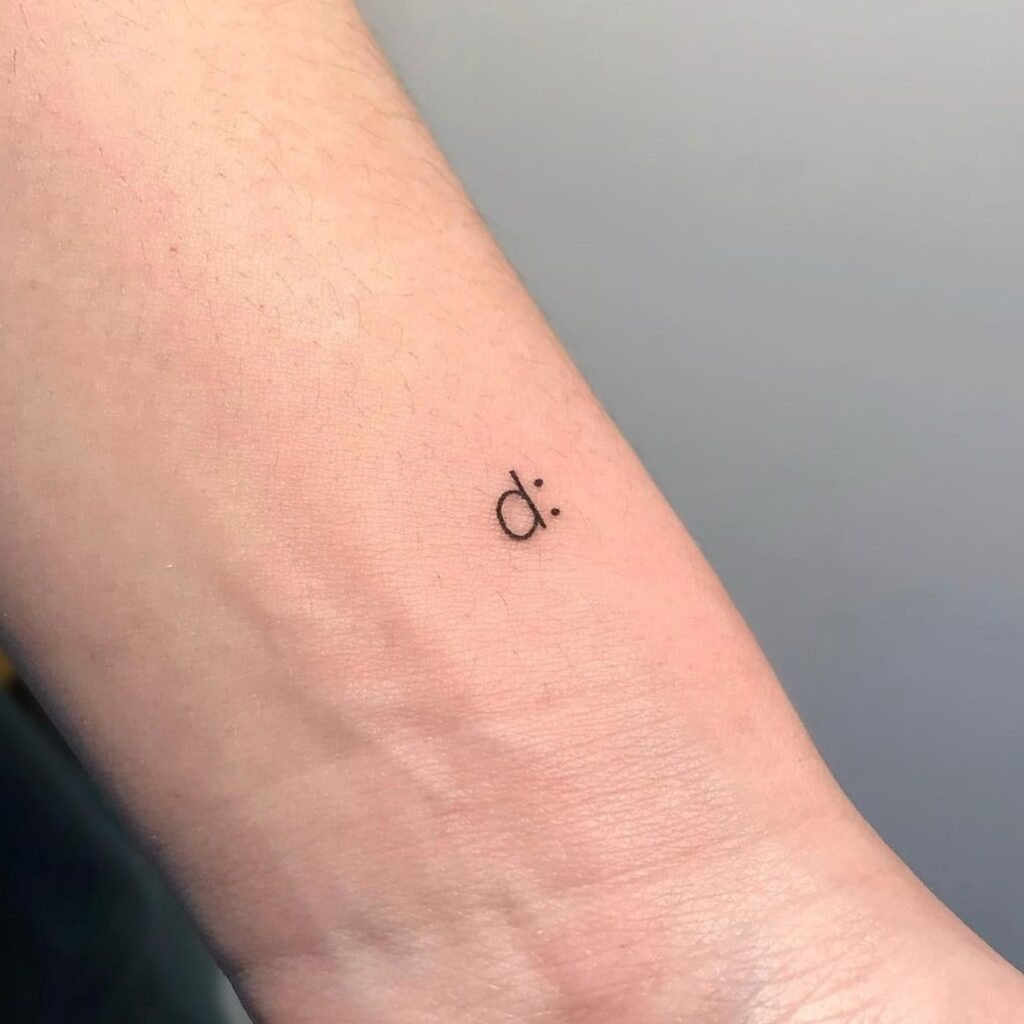 Emoji line small tattoo