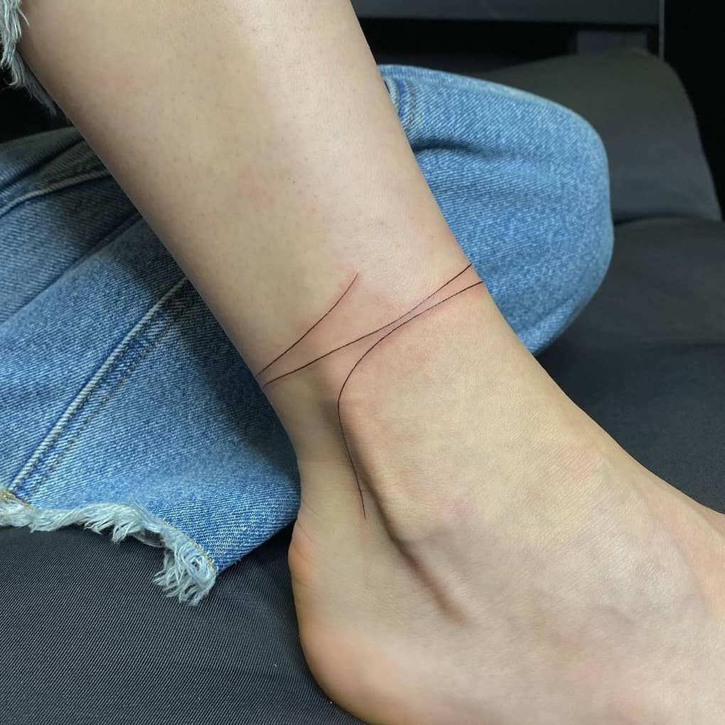 Ankle line tattoo