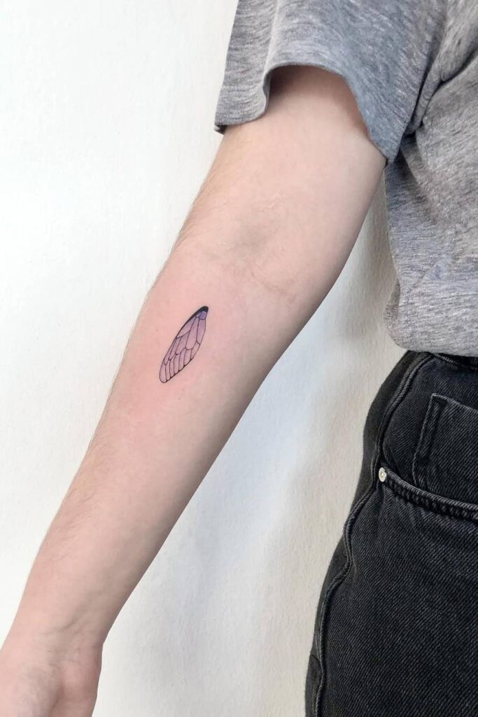 Wings line tattoo