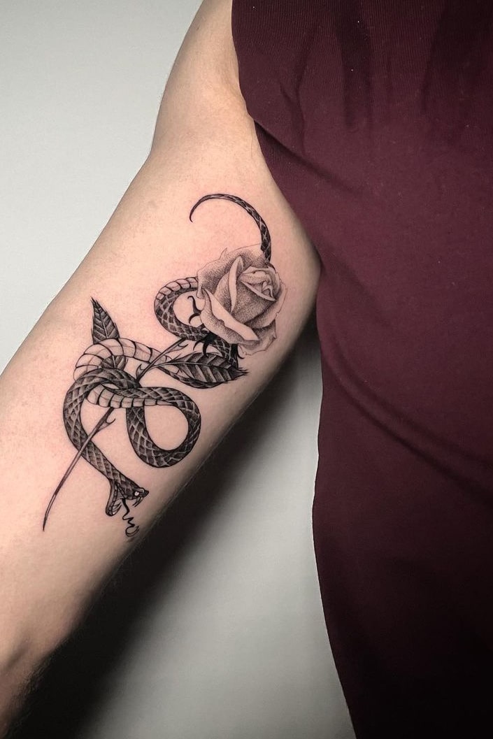 Snake and rose tattoo