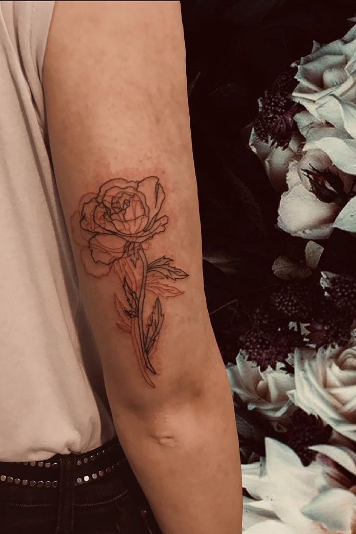 Unique rose tattoo