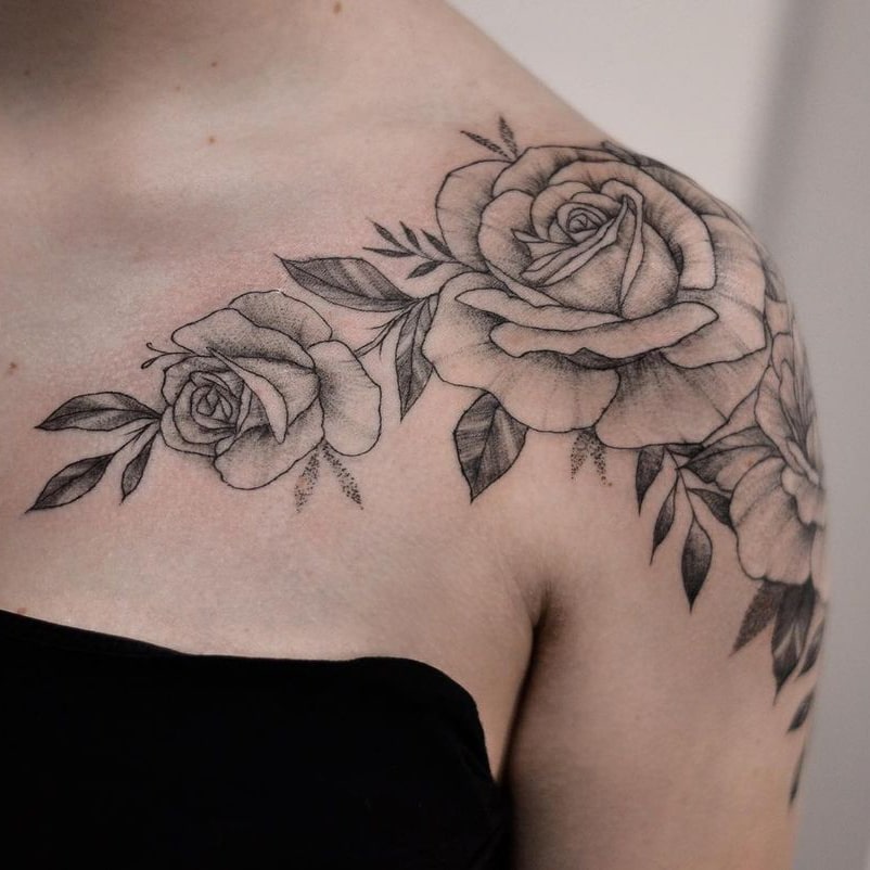 Rose tattoo on shoulder