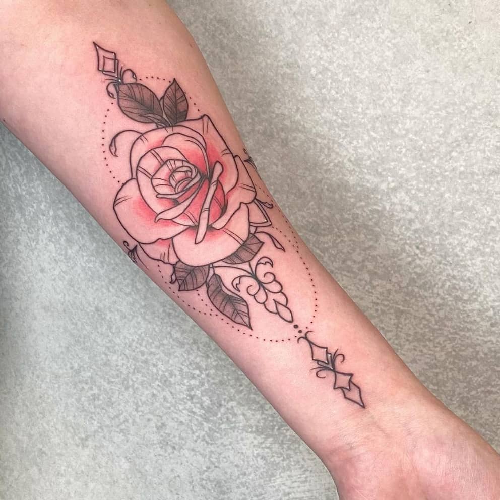Rose tattoo on arm