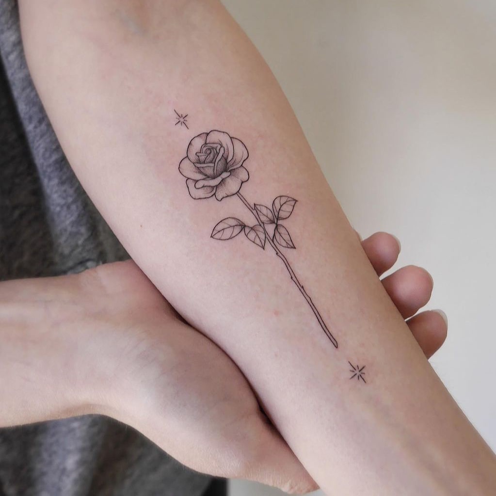 Stylish and simple rose tattoo