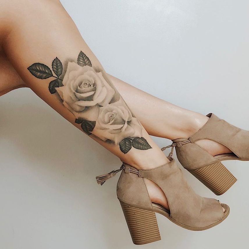 Rose tattoo on leg