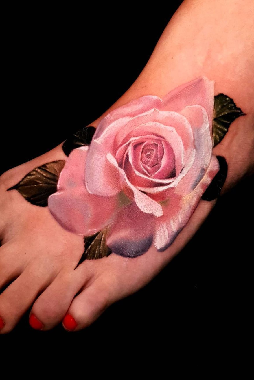 Rose tattoo on foot