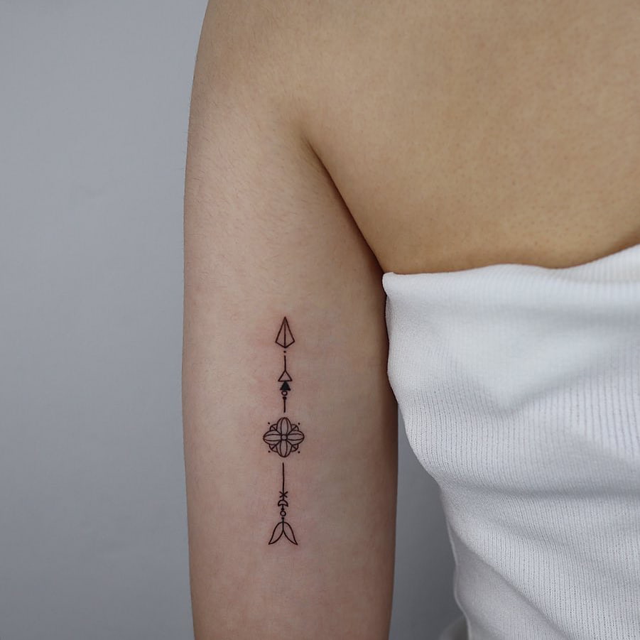 Small arrow tattoo