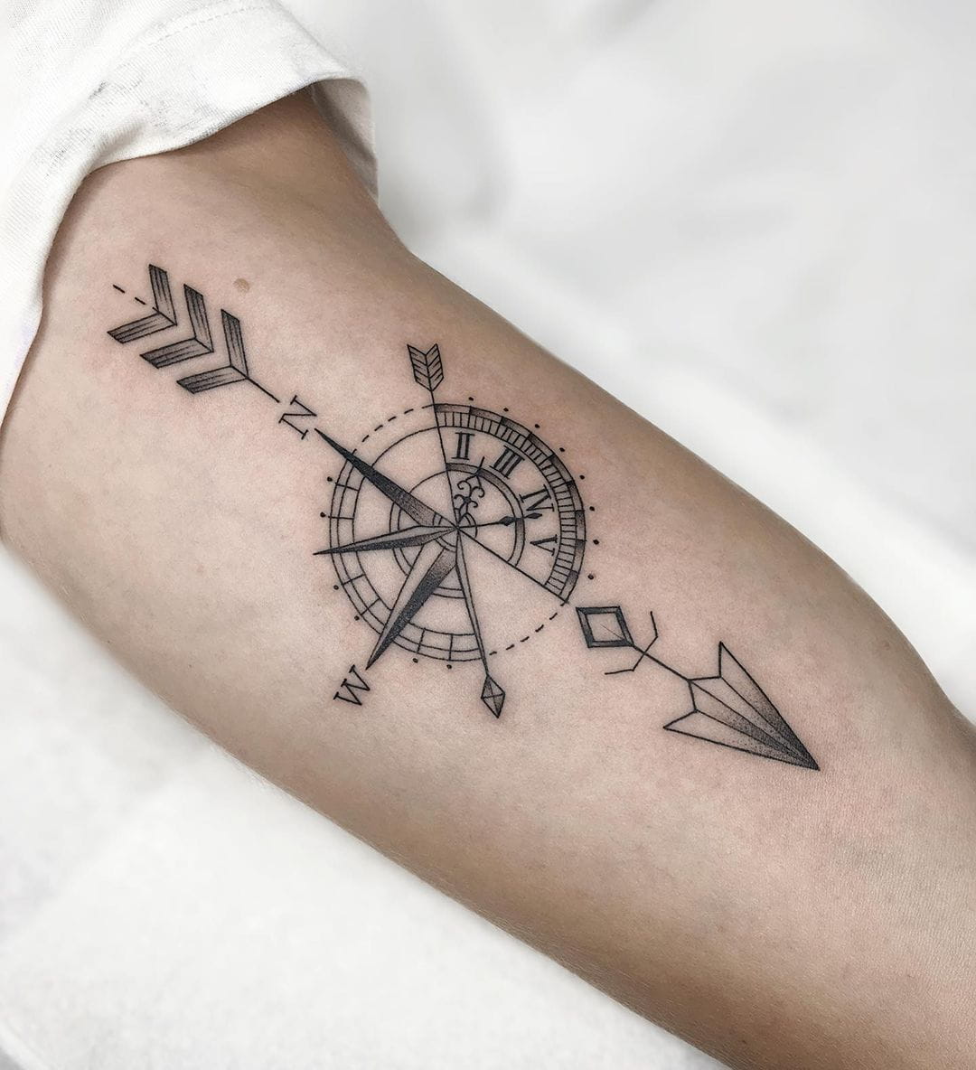 Compass arrow tattoo