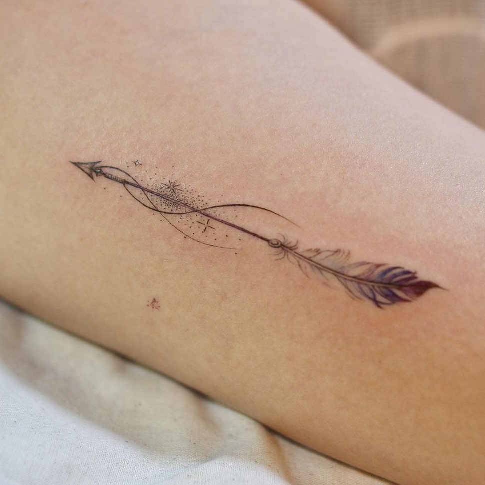 Feather arrow tattoo