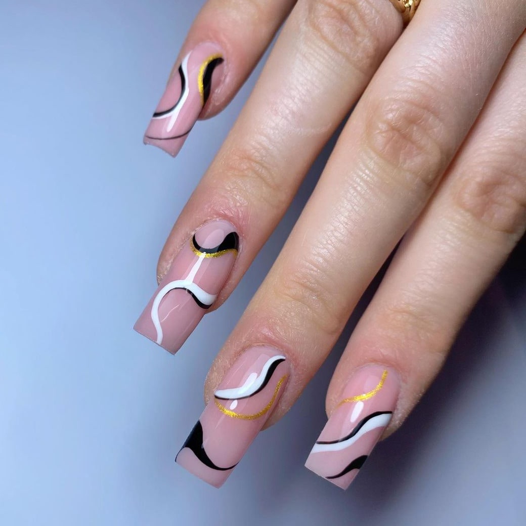 Black, white and gold negative space coffin nails