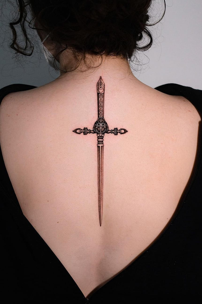 Sword back tattoo