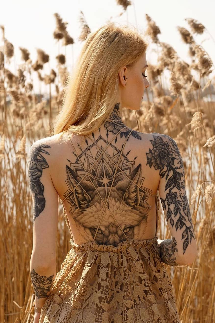 Gorgeous wolf back tattoo