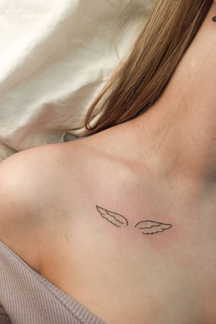 Wings collarbone tattoo