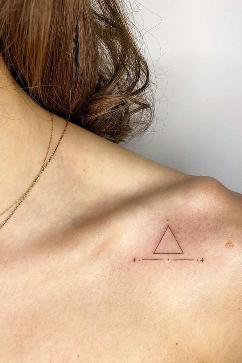 Geometric collarbone tattoo