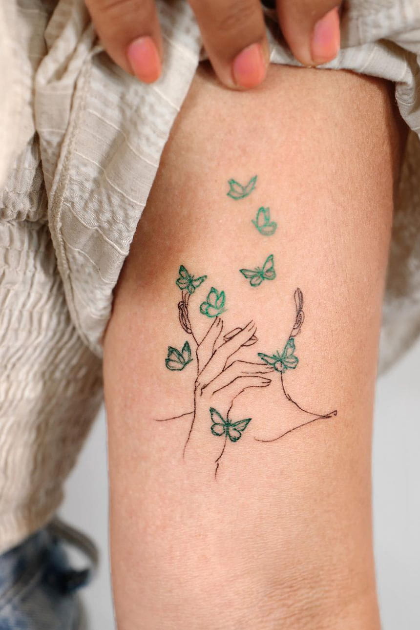 Minimalist small colorful tattoo