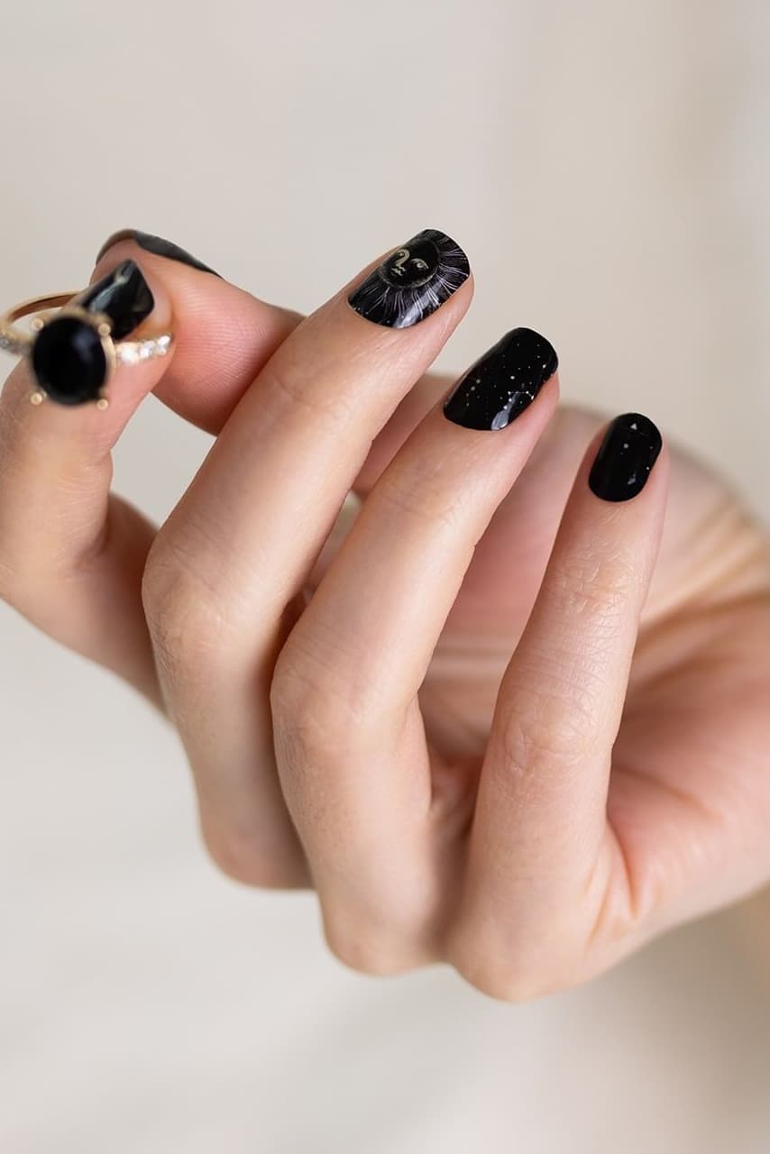 Black short galaxy nails