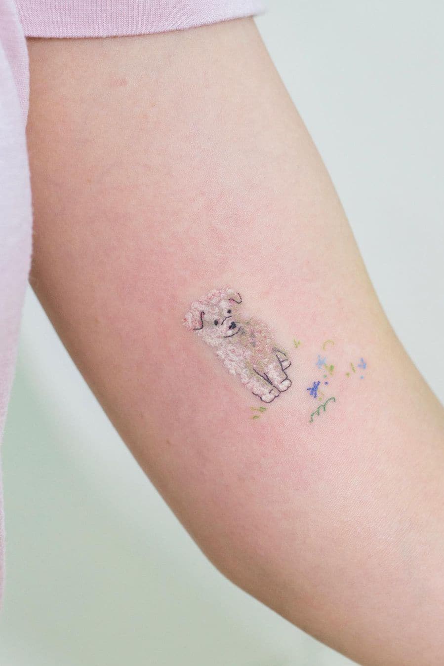Cute white dog tattoo