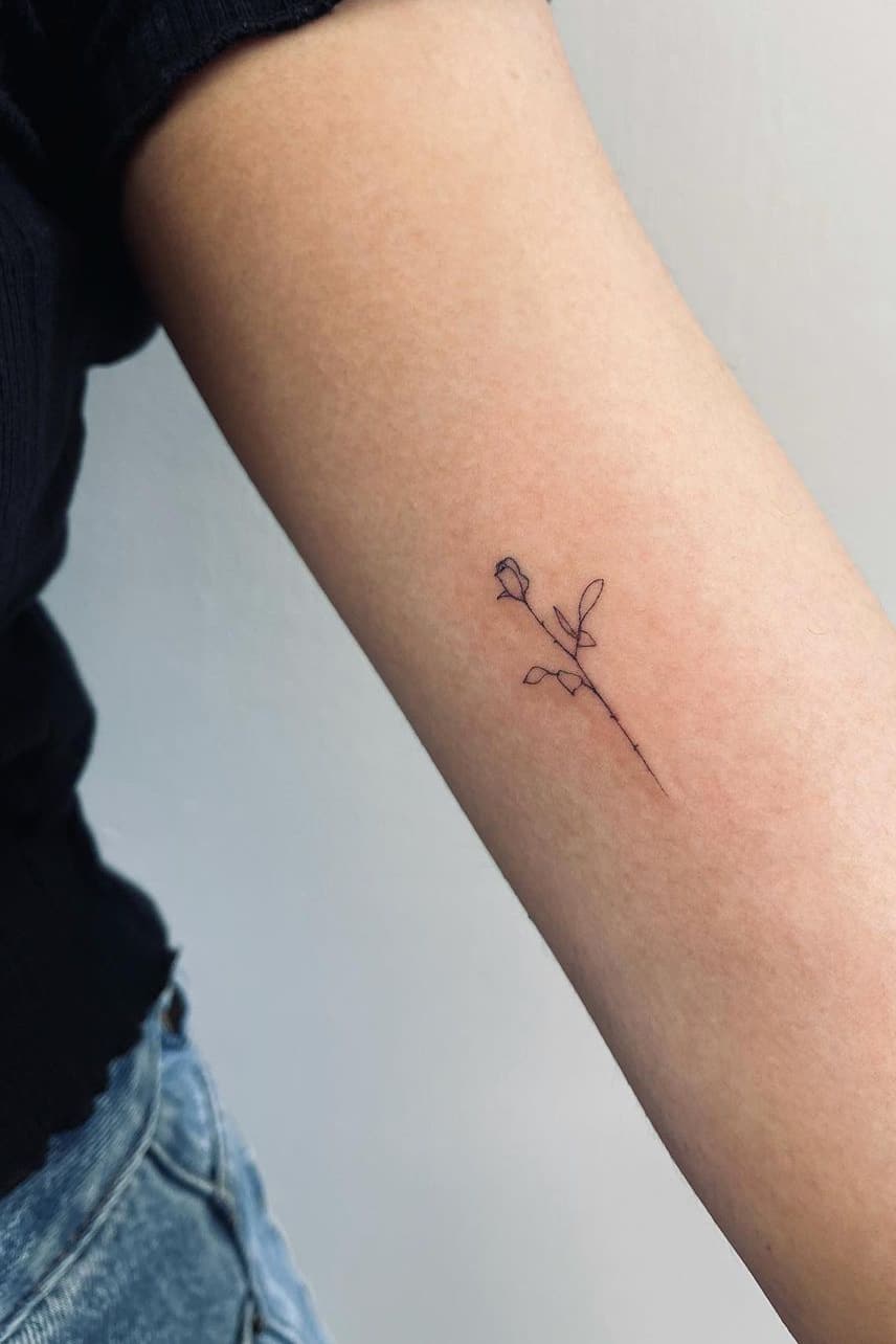 Fine line rose tiny tattoo