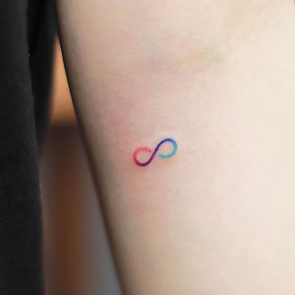 Gradient tiny infinity symbol tattoo
