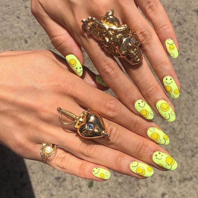 Light yellow oval smiley nails