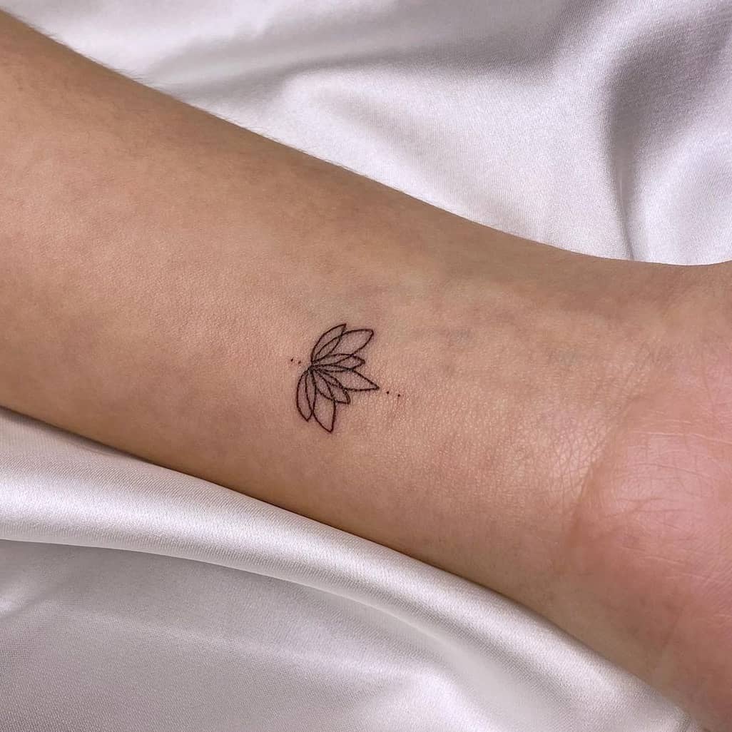 Lotus tattoo on wrist