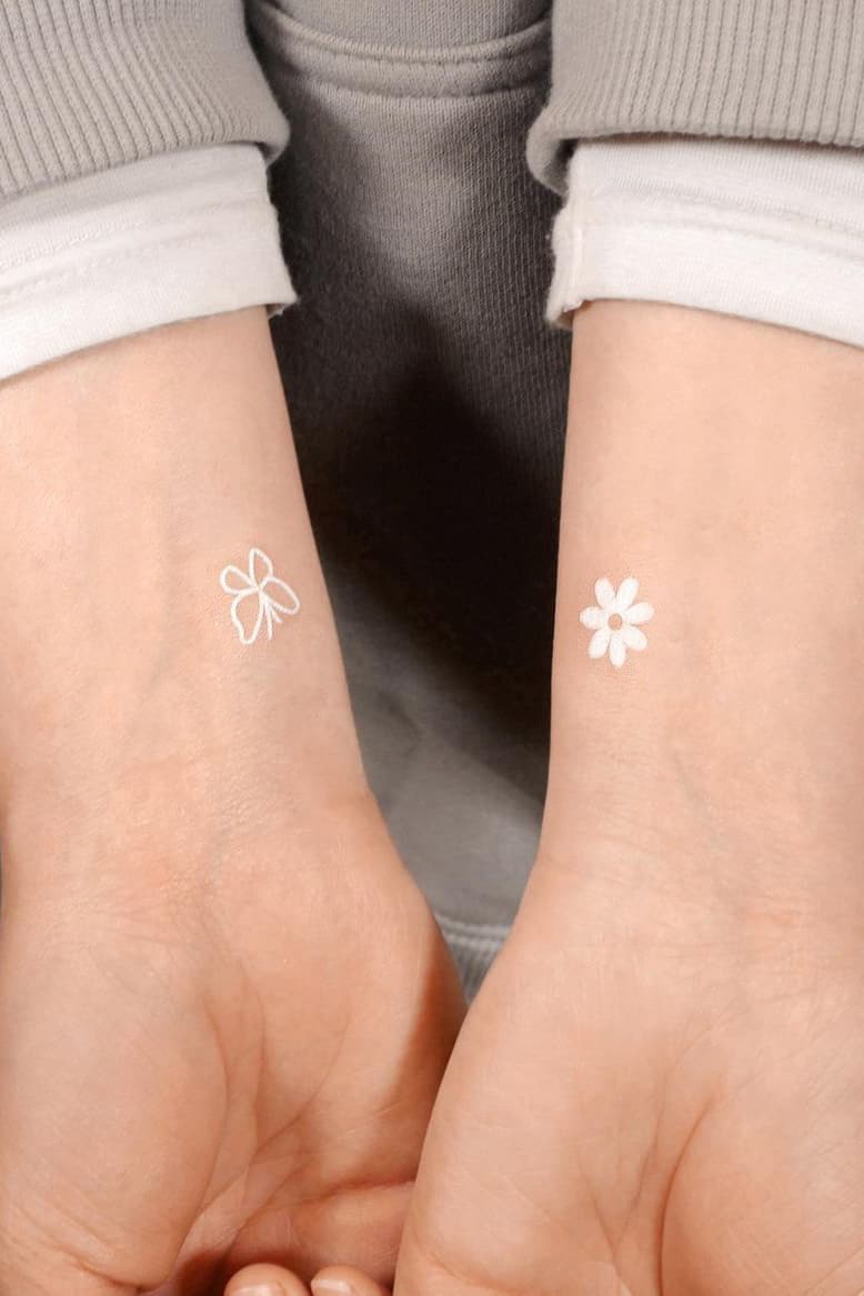 Mini white tattoo
