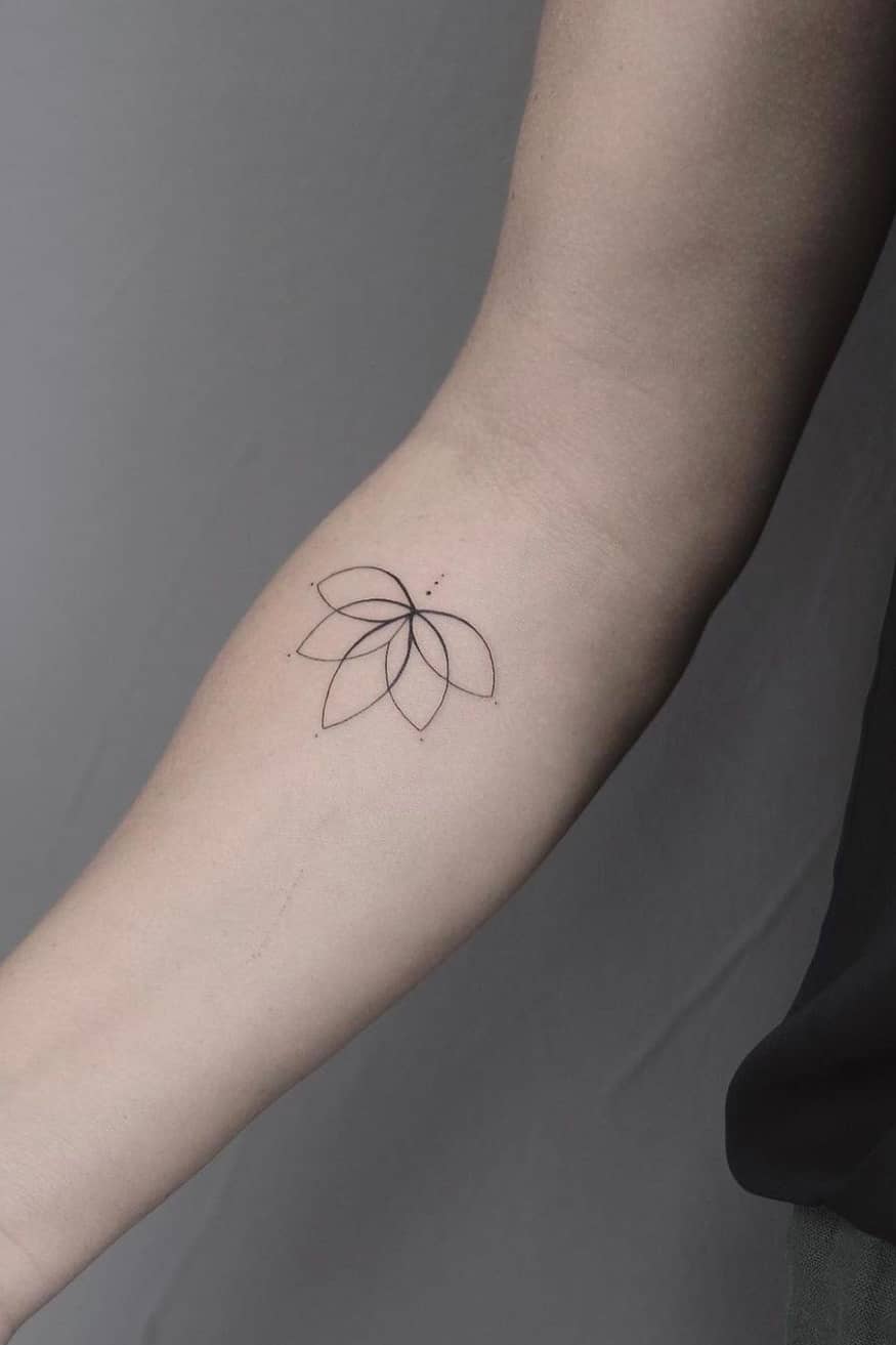 Minimalist lotus tattoo